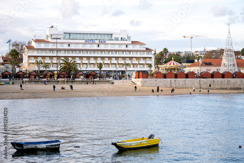Cascais beach waterfront with hotel Baia and anchored boats
