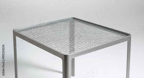 Rust proof metal table designed with an open mesh surface