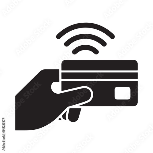 Contactless payment with a credit card held near a reader symbol