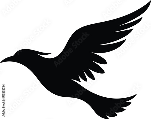 A black silhouette of a bird in mid flight against a white background wings spread wide in a dynamic pose