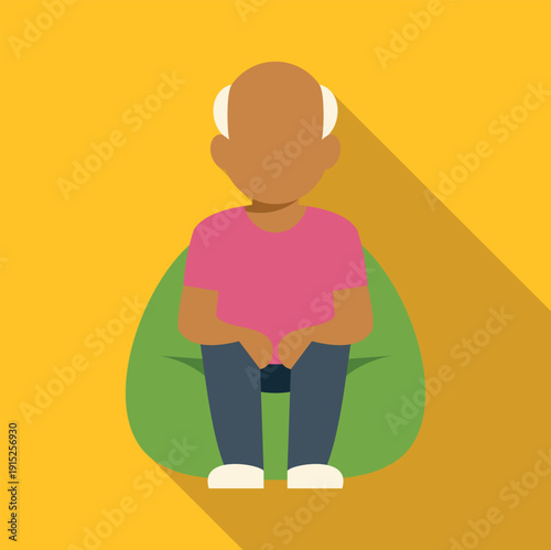 Senior man sitting comfortably on green beanbag chair with long shadow