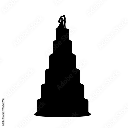 Elegant silhouette of a tiered wedding cake with a couple on top.