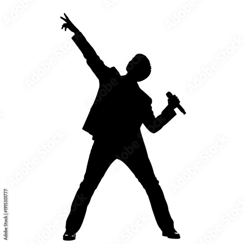 Silhouette of a man singing passionately into a microphone on stage.