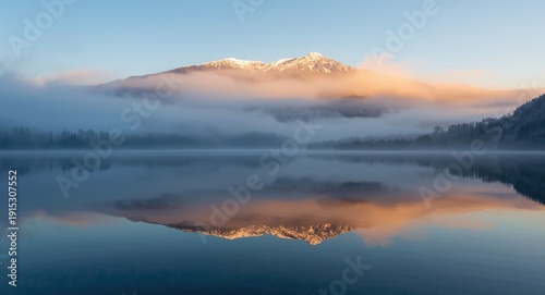 Mist envelops mountain rang...