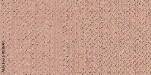 Close up of a rough textured reddish brown stucco wall surface