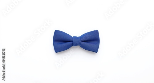 blue bow tie resting on a b...