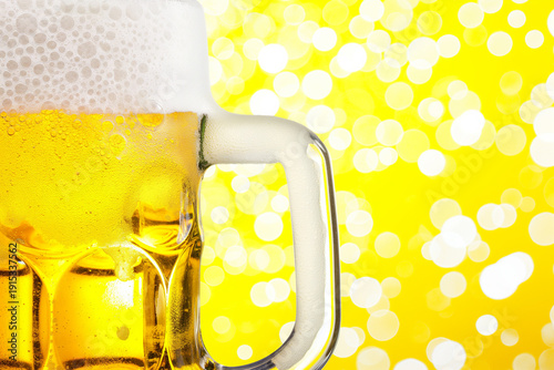 A close-up of a mug of beer with a handle, against a yellow background with white dots