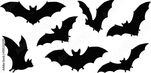 A collection of seven black bat silhouettes in various flying poses against a plain white background, creating a spooky Halloween atmosphere.