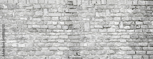 Gray rough stone wall textured background surface