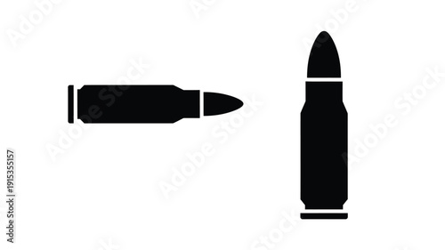 Two bullets depicted in a stark black silhouette