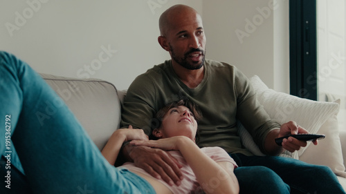 Wallpaper Mural Cozy Family Moment On Couch With Dad Watching TV Torontodigital.ca