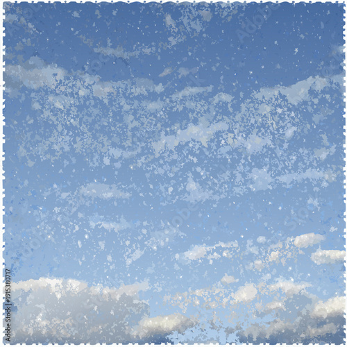 A vibrant blue sky filled with scattered fluffy white clouds