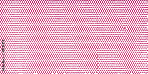 Close up of a pink patterned surface resembling small circles or dots