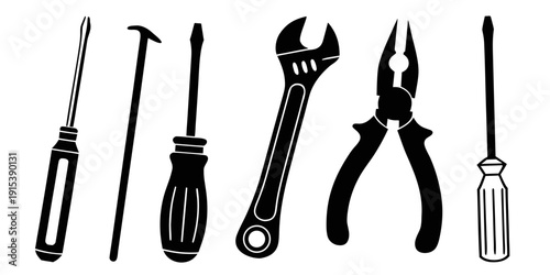A variety of tools including a hammer, wrench, pliers, and screwdriver Vector