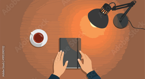Overhead view of hands holding a notebook under a desk lamp with a cup of coffee on a wooden desk, symbolizing work and study