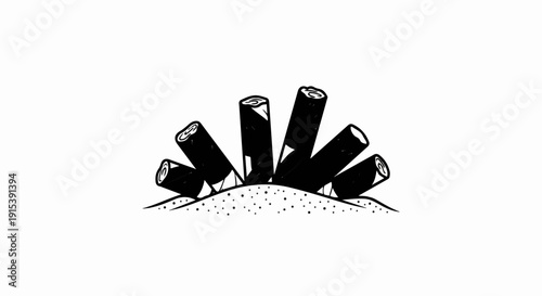 A cluster of discarded cigarette butts in the ground