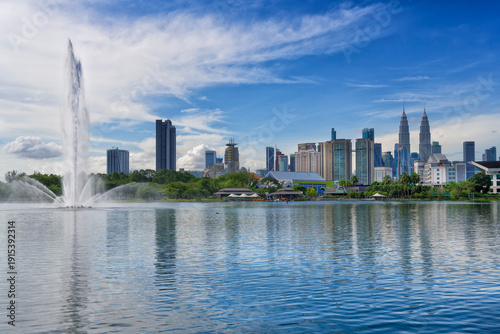 Jet d?eau in Titiwangsa Lake Garden and Kuala Lumpur city skyline, Malaysia, Asia