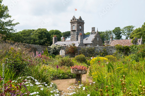 The walled garden with the house in the background, La Seignerie, Sark island, Channel Islands, Bailiwick of Guernsey, United Kingdom