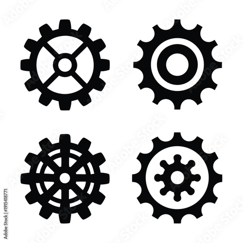 Four black and white gear with different internal mechanical industrial