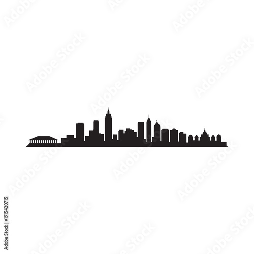 A striking black silhouette depicts a sprawling city skyline against a white background