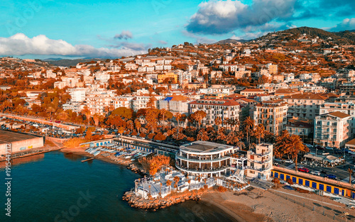 Quadro su tela Drone panorama of Sanremo harbor and yachts during colorful sunset sky