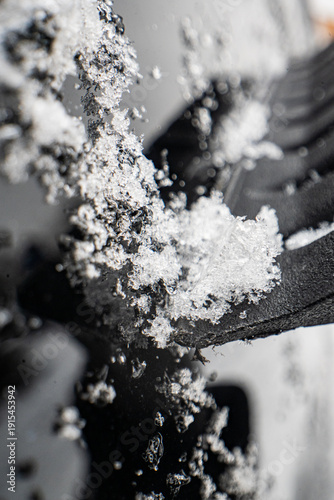 Scraping Ice and Snow from Car Windshield on a Cold Winter Morning