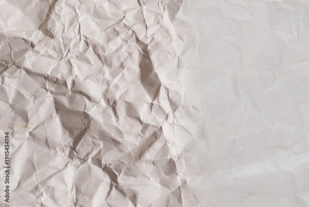 Obraz premium Crumpled white paper background.