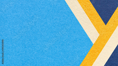 Abstract blue textured paper background with beige, yellow, navy geometric lines, copy space for banner presentation