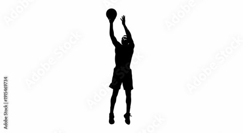 Dynamic silhouette of a basketball player midshot capturing athletic movement.