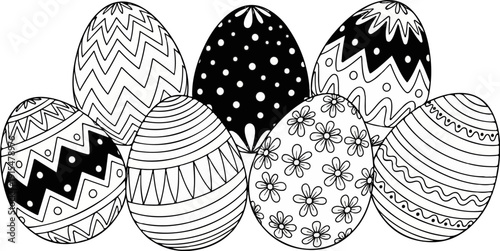An assortment of decorated Easter eggs with varied patterns in black and white