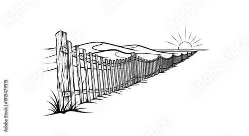 A wooden fence stretches along a sandy dune towards a sunrise over the ocean