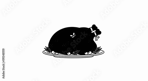 A stylized black silhouette of a roasted bird on a platter with greens