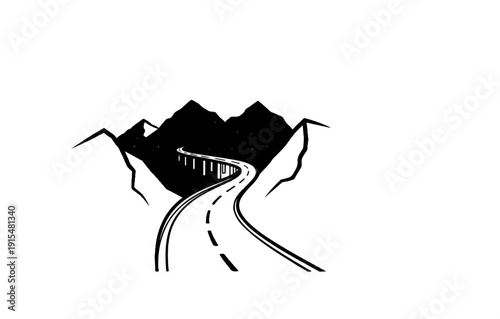 A winding road curves through mountains with a bridge ahead