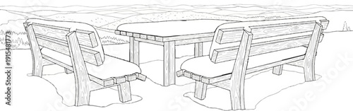 A wooden table and two benches in snow-covered landscape with distant hills