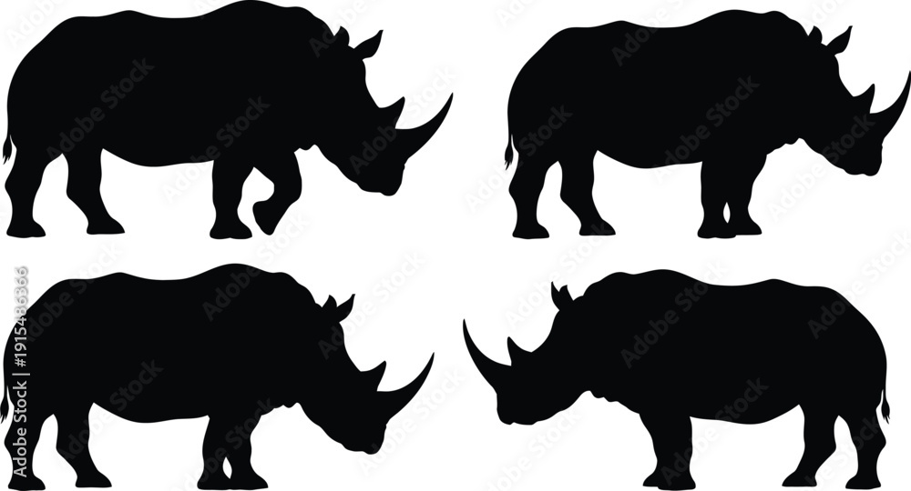 Fototapeta premium Four black silhouettes of rhinoceroses on white background