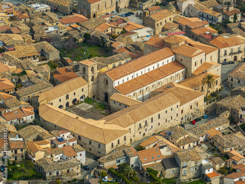 Aerial view of Duomo of Gerace, a town and comune in the Metropolitan City of Reggio Calabria, Calabria, southern Italy. The co-cathedral basilica of Santa Maria Assunta in Gerace