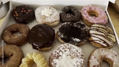 box of freshly baked doughnuts