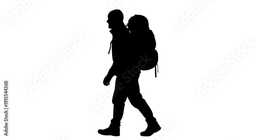Silhouette of a hiker with a large backpack walking.