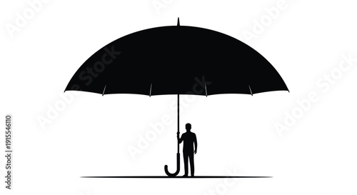 Person standing under large open umbrella providing shelter from elements