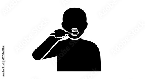 Silhouette of a person brushing their teeth with a toothbrush.