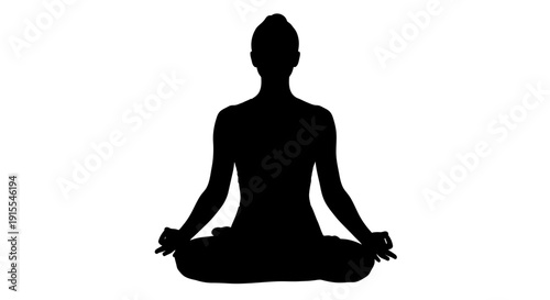 Silhouette of a person meditating in a peaceful lotus pose.