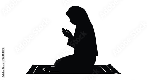 A black silhouette depicts a woman kneeling in prayer on a patterned rug showcasing a devotional and peaceful moment silhouette