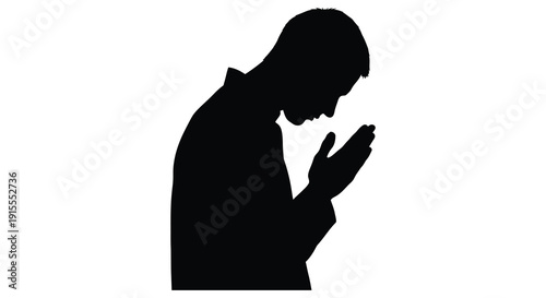 A black silhouette depicts a man in a suit with his head bowed and hands clasped in prayer against a stark white background