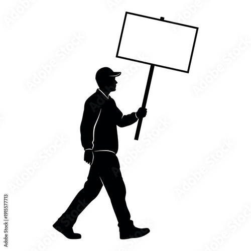 A silhouette of a man walking while holding a blank sign