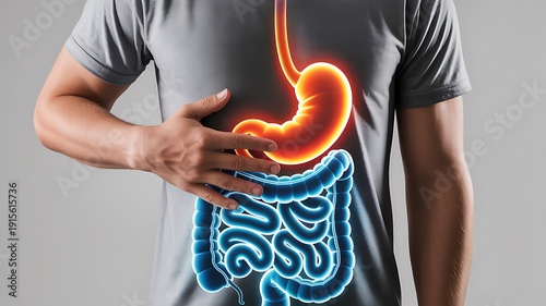 Person holding stomach with glowing digestive system on shirt