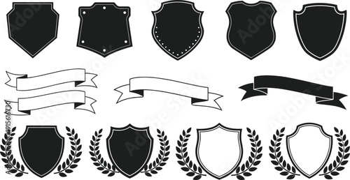 Heraldic shield vector set including vintage ribbons laurel wreaths and trophy badges isolated on white background for classic logo design