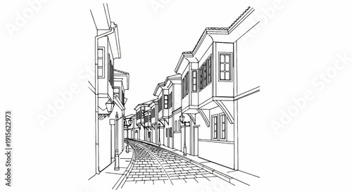 Narrow cobblestone street lined with traditional, multi-story houses