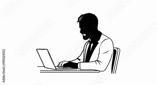 Man in suit working on laptop