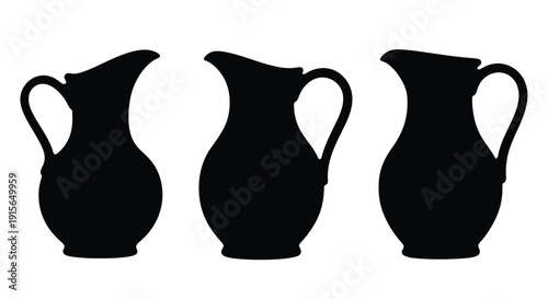 Three black pitchers displayed in a minimalist stark silhouette