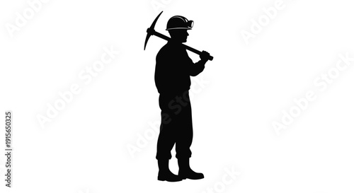 A miner stands with a pickaxe over his shoulder a dark silhouette